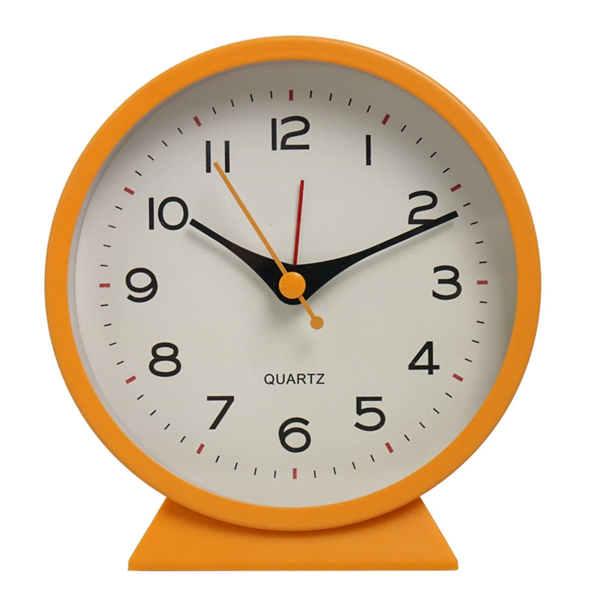 Orange clock with a white face on a white background