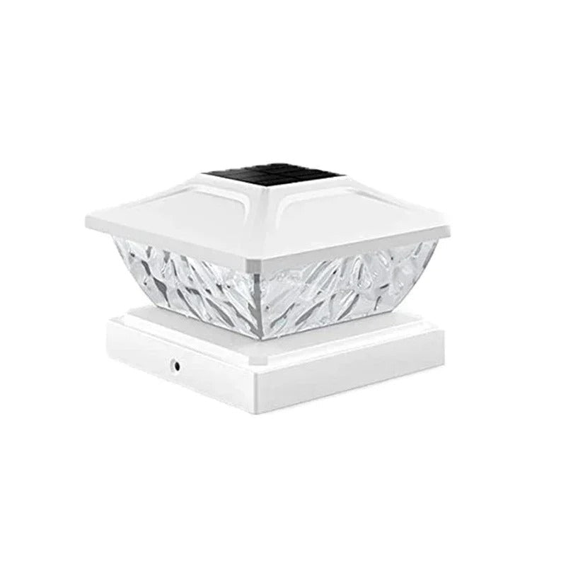 White solar post cap light with crystal design on a white background