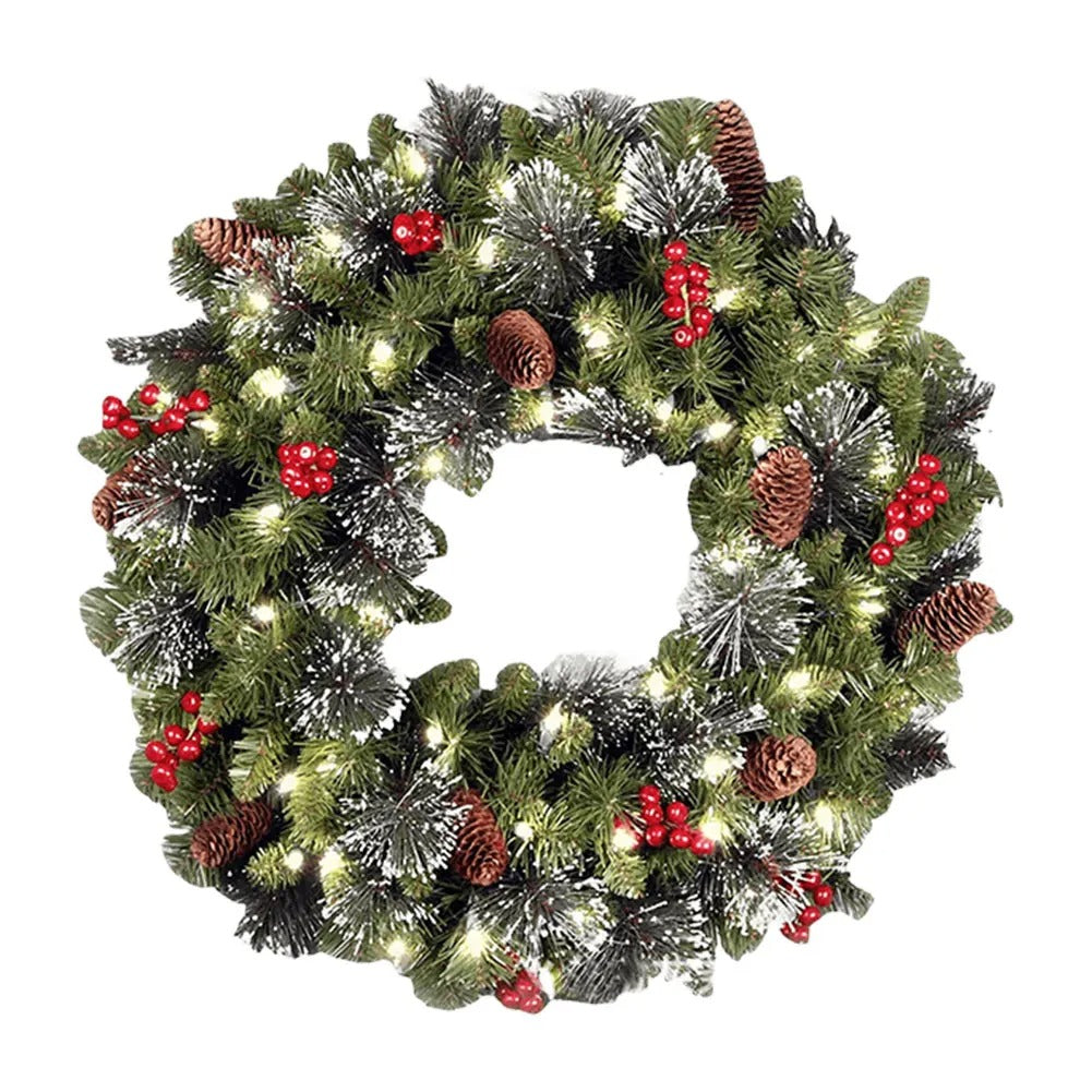 Decorative Christmas wreath with lights, pinecones, and berries on a white background