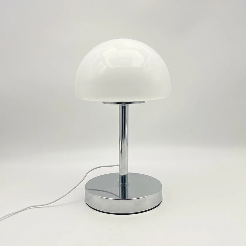 White table lamp with a chrome base on a white background